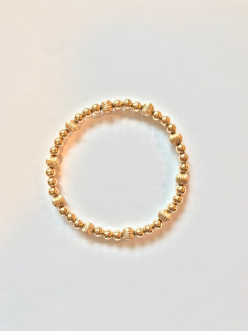 5mm 14k Gold Filled Bead Bracelet with 6mm Corrugated Accent Bead